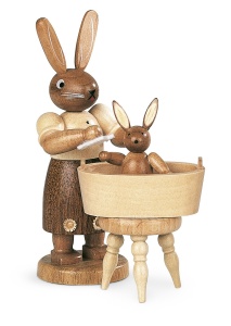 Easter bunny, female, with little child have a bath