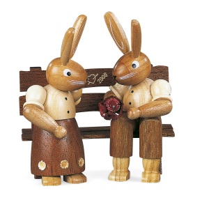 Easter bunny, couple, on garden bench