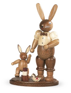 Easter bunny, male, with playing child